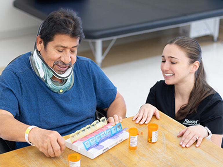 neurologic patient working with physical therapist