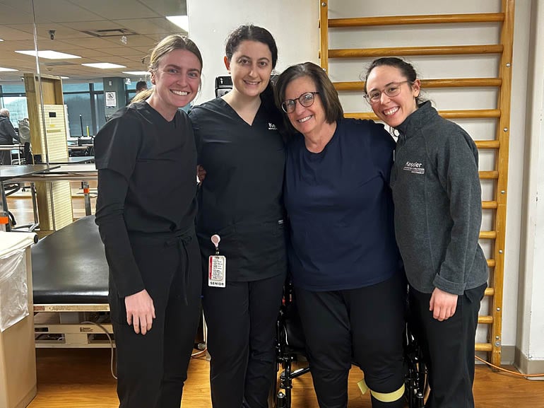 Maria Meeks with her therapists at Kessler Institute for Rehabilitation