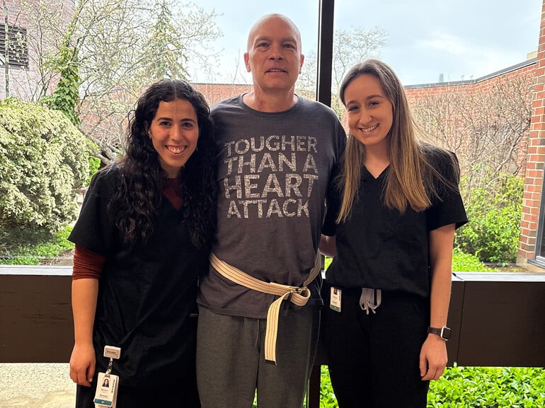 Steven Ryan with his therapists at Kessler Institute for Rehabilitation.