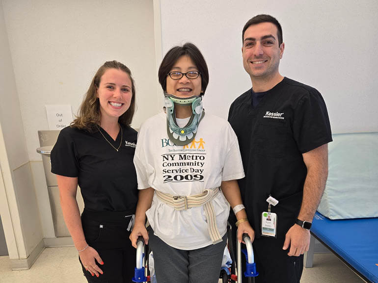 Photo of Mary Yan and her therapists at Kessler Institute for Rehabilitation.