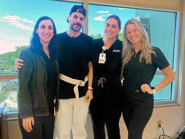 Photo of Charles Schembri with his therapists at Kessler Institute for Rehabilitation - West Orange.
